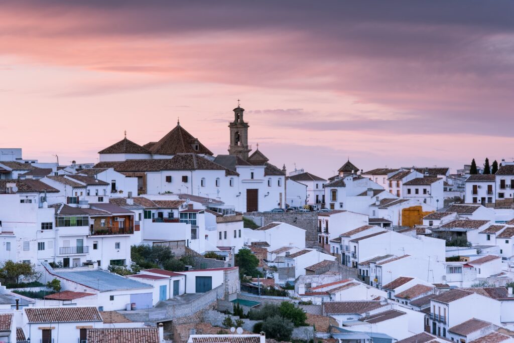 Rooftops and illuminated cityscape of Antequera,Spain